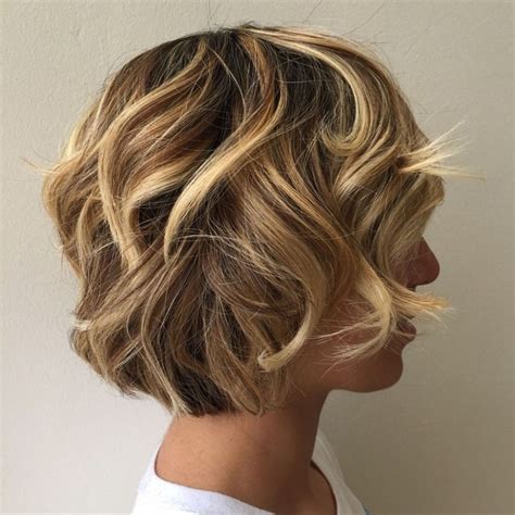 Curly Layered Shaggy Bob This hairstyle takes the beloved 80s shag cut and shortens itliterally. . Layered curly bob